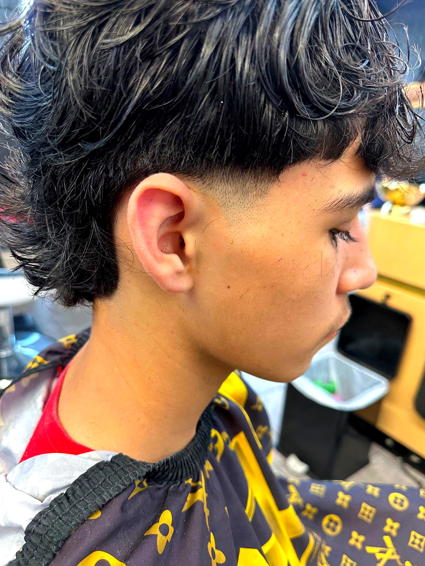 Trabajo de barbería en Golden Clippers