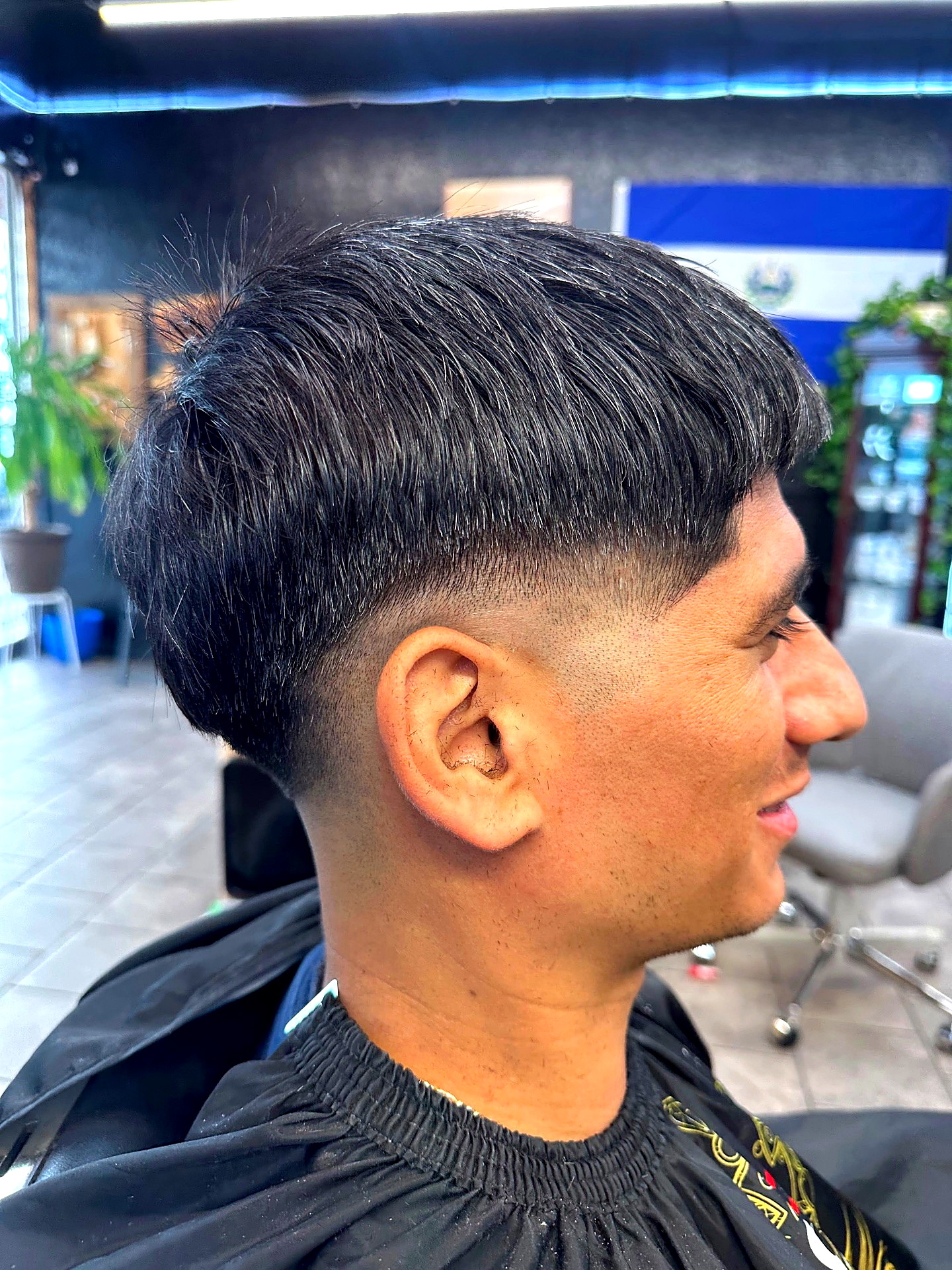 Trabajo de barbería en Golden Clippers