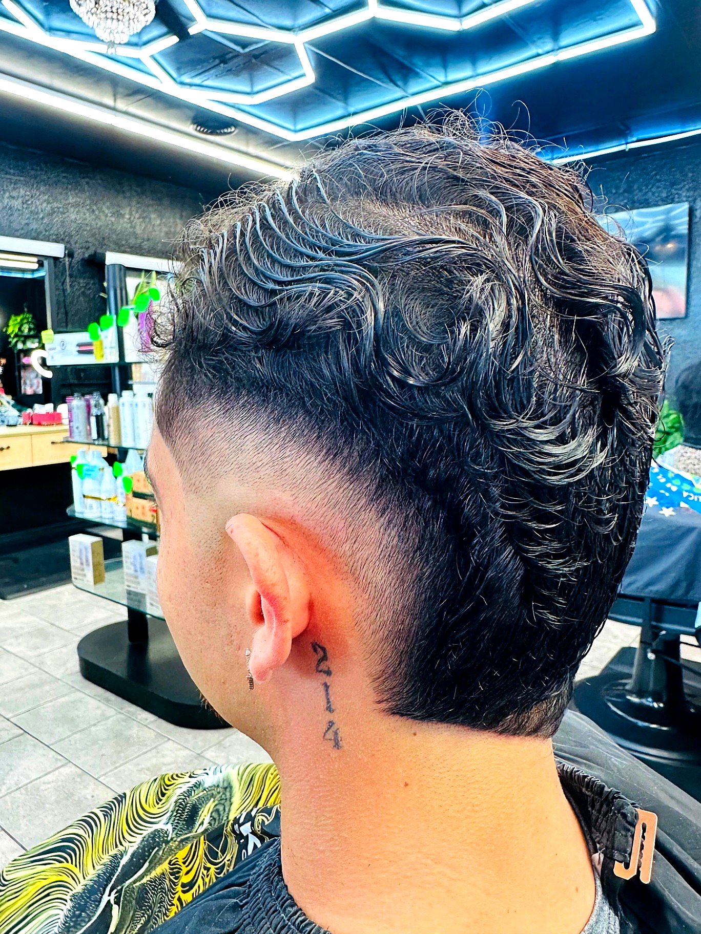 Trabajo de barbería en Golden Clippers